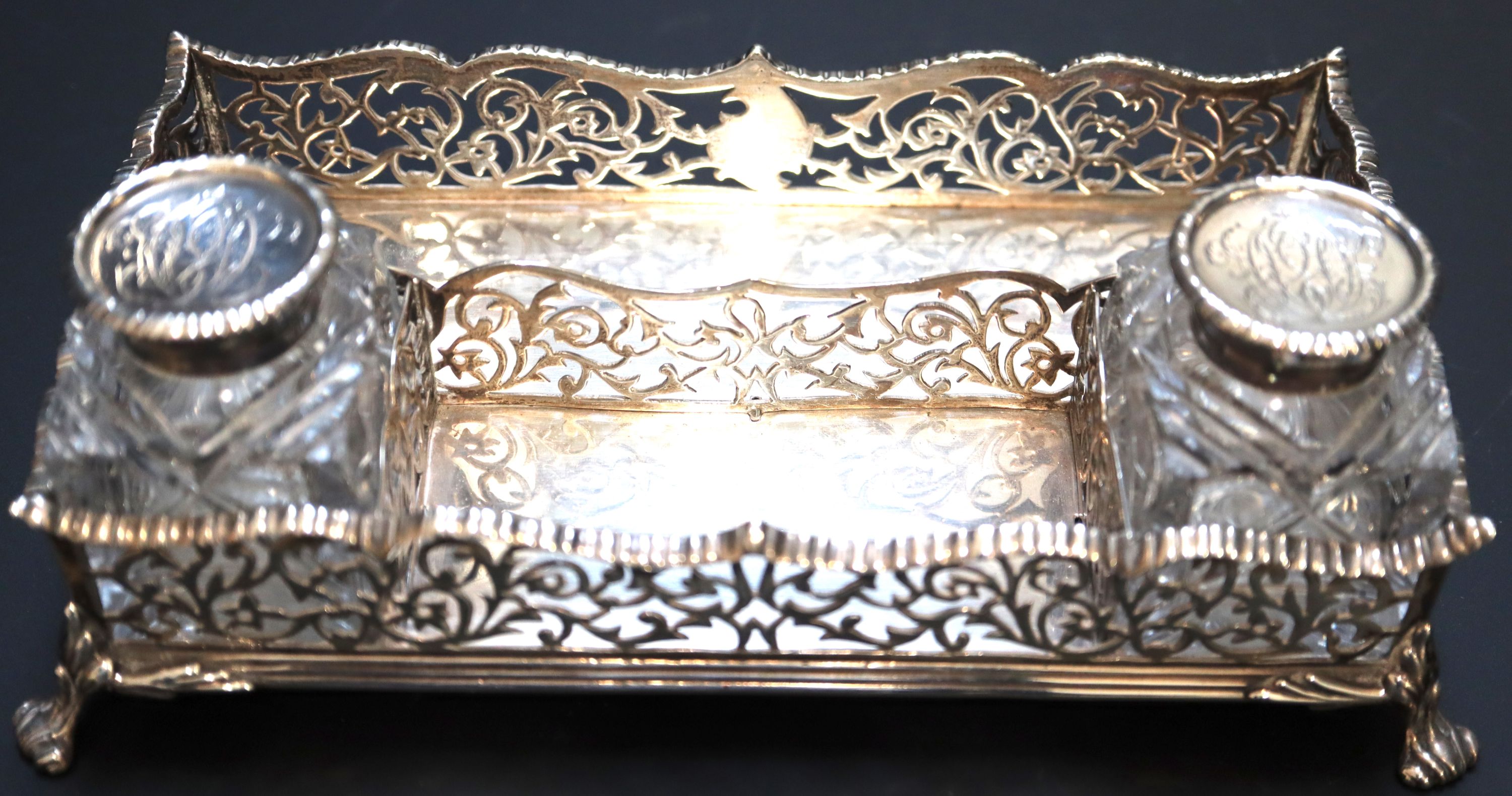 A Victorian silver rectangular inkstand with pierced gallery and two glass wells, Charles Stuart Harris, London, 1886/7, 18.7cm,